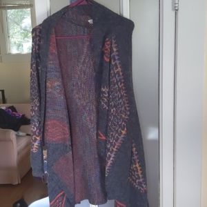 Long sleeved asymmetrical sweater